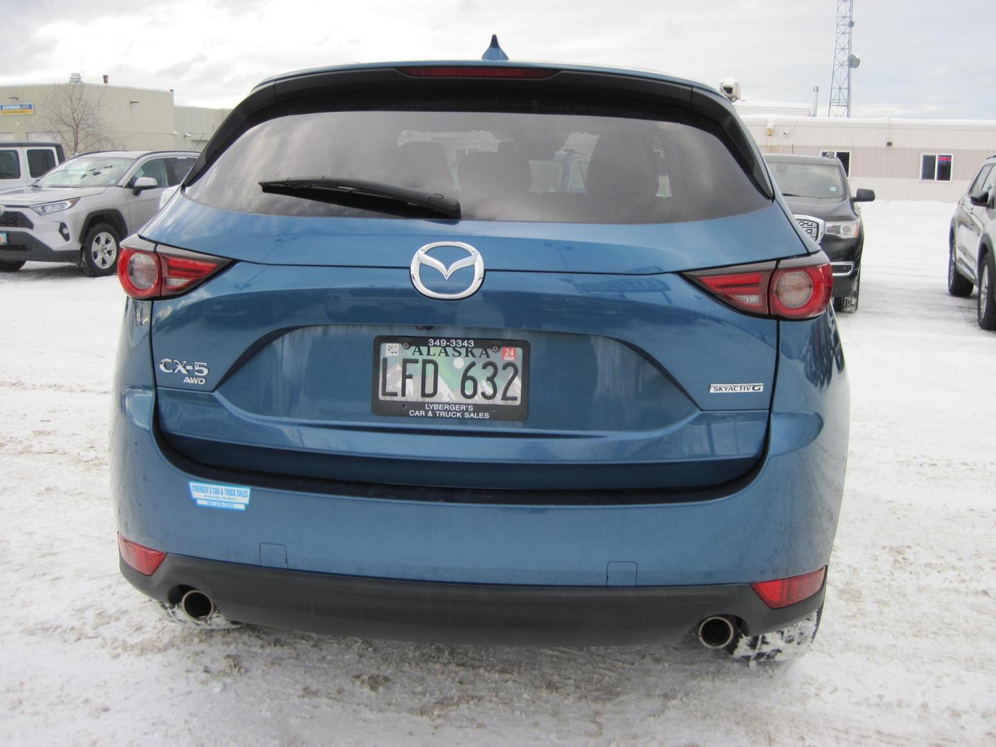 2021 blue /black Mazda CX-5 (JM3KFBDM6M1) , 6A transmission, located at 9530 Old Seward Highway, Anchorage, AK, 99515, (907) 349-3343, 61.134140, -149.865570 - Nice Mazda CX-5 Grand Touring sunroof, come take a test drive. - Photo#3